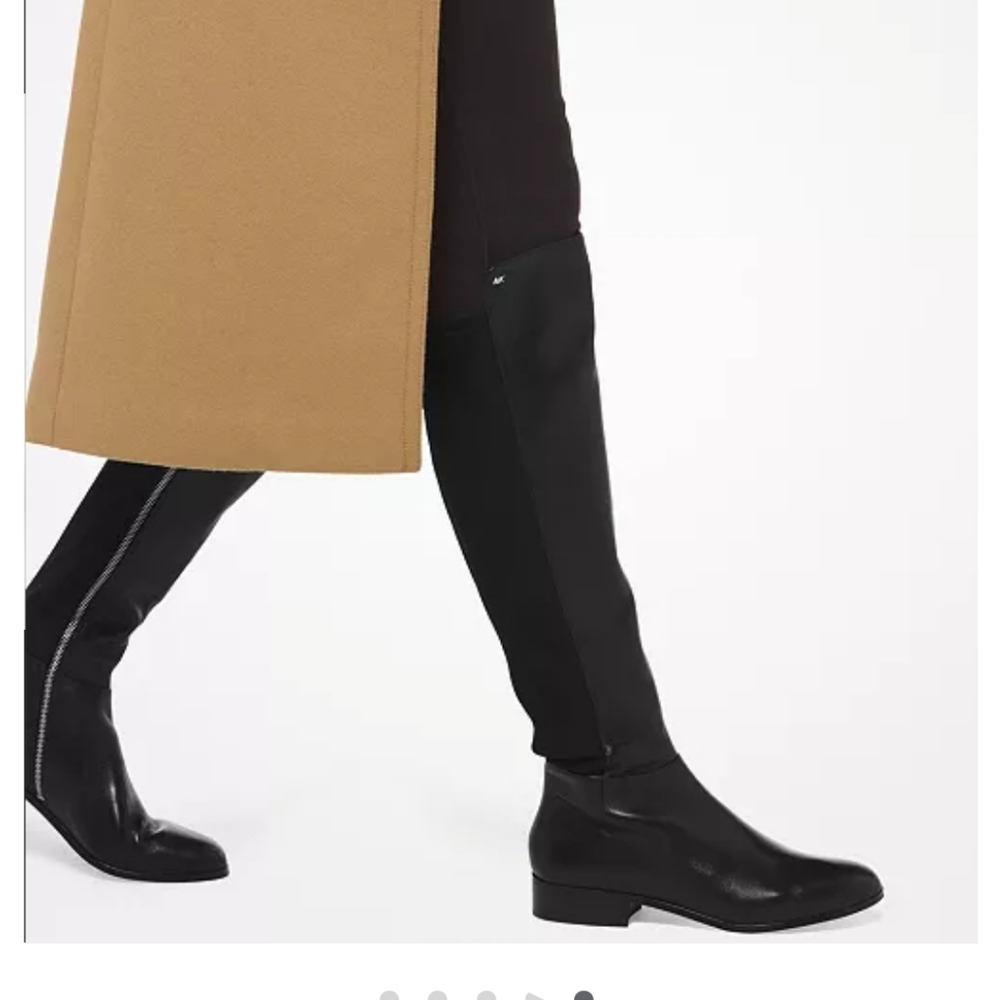 Worn once- Michael kohrs knee length leather boot. Women size 8.5
